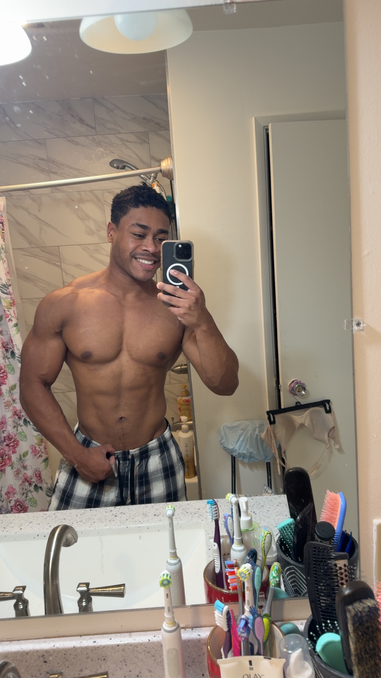 Zeke Hayes taking a personal fitness progress photo